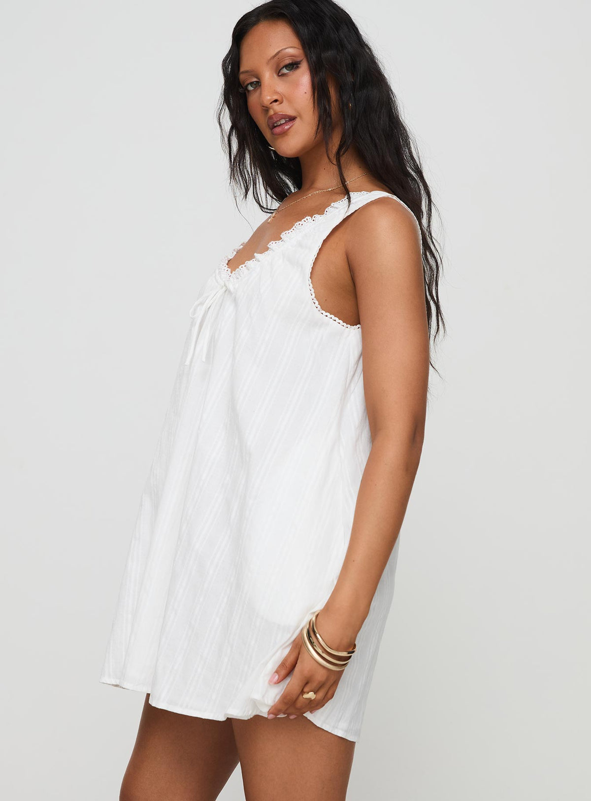 side view of model wearing Princess Polly Antiquity Swing Mini Dress White V-Neck 