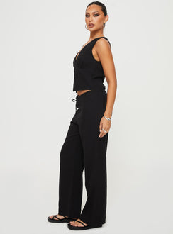 side view of model wearing Princess Polly Zanzibar Pants Black Low Rise Pants Pants 