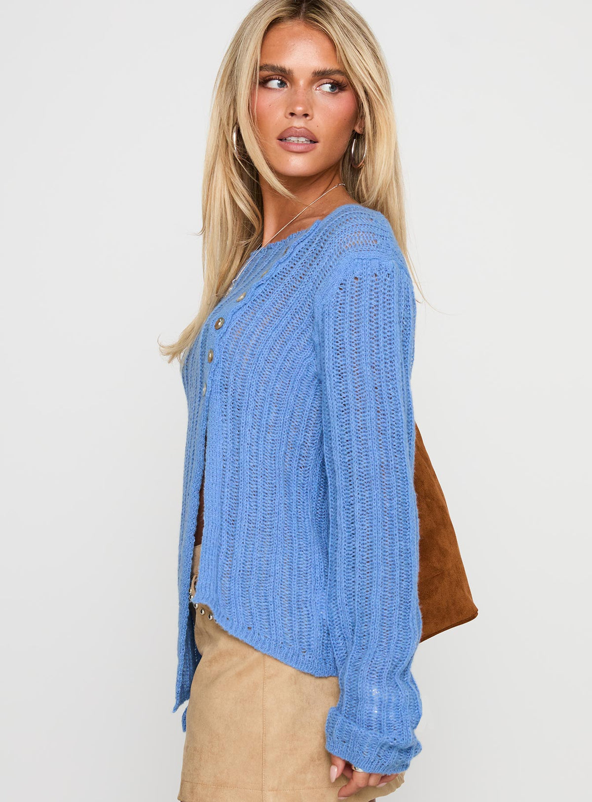 Showcasing the Lenker Knit Jumper Blue womens-jumpers in short length side view of model wearing Princess Polly