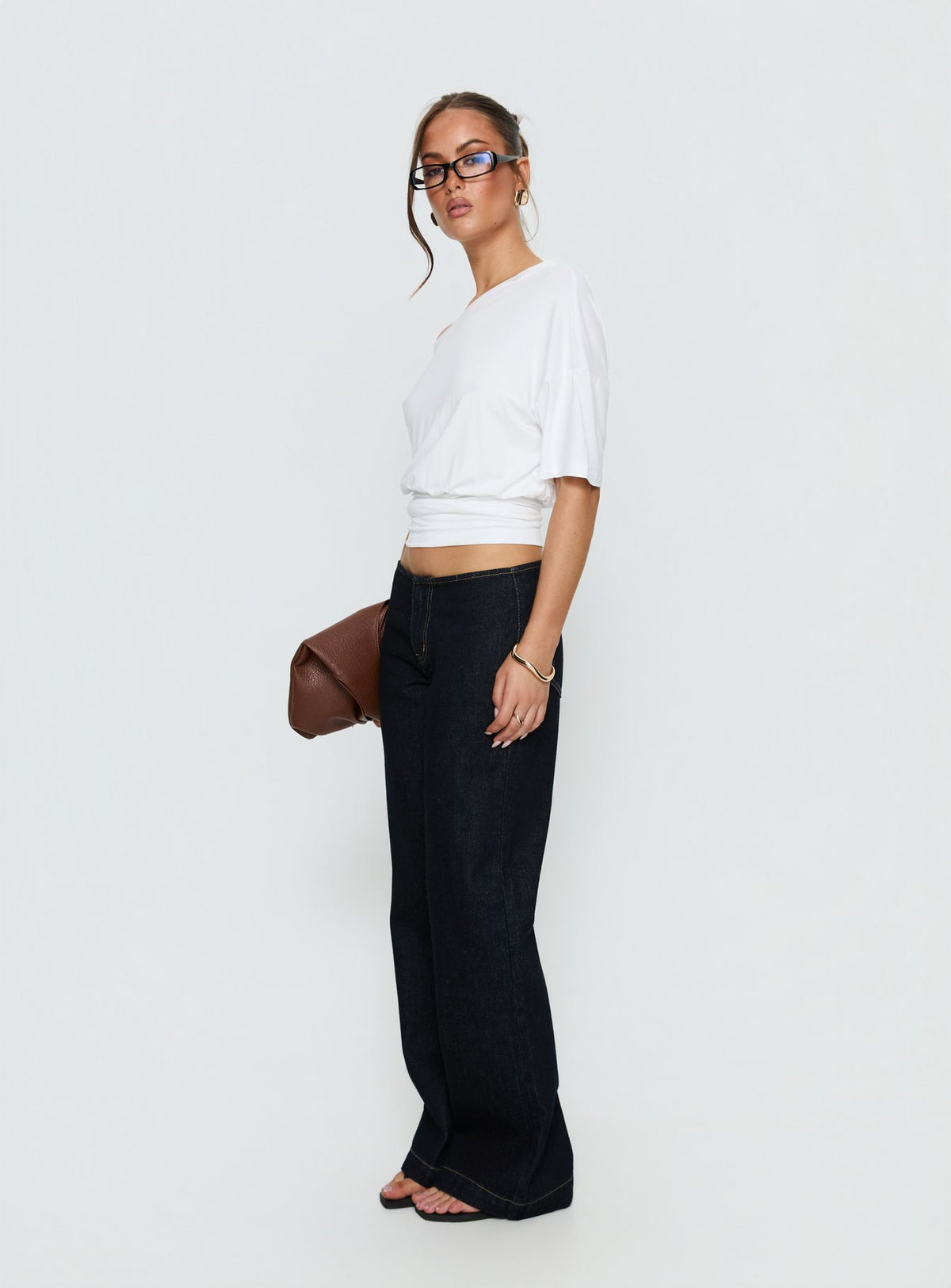Featuring Buenos No Waist Low Rise Straight Leg Jeans in Raw Denim womens-jeans with low-rise waist side view of model wearing