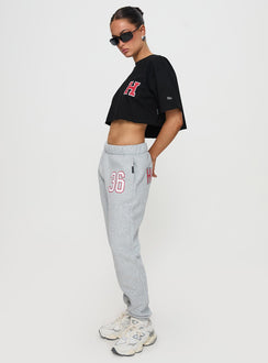 side view of model wearing Princess Polly Harvard Sweatpants Grey Pants 