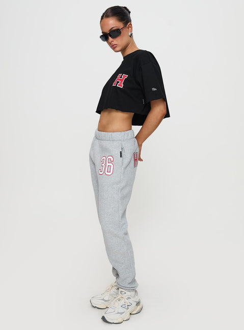 side view of model wearing Princess Polly Harvard Sweatpants Grey Pants 