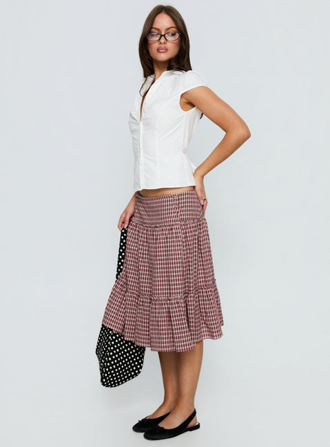   side view of model wearing Princess Polly Cascades Low Rise Midi Skirt Red Check Midi Skirts Skirts 
