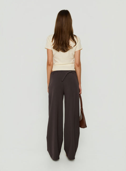 Featuring Mericana Low Rise Wide Leg Pants in Brown womens regular pants with low-rise waist back view of model wearing Princess Polly