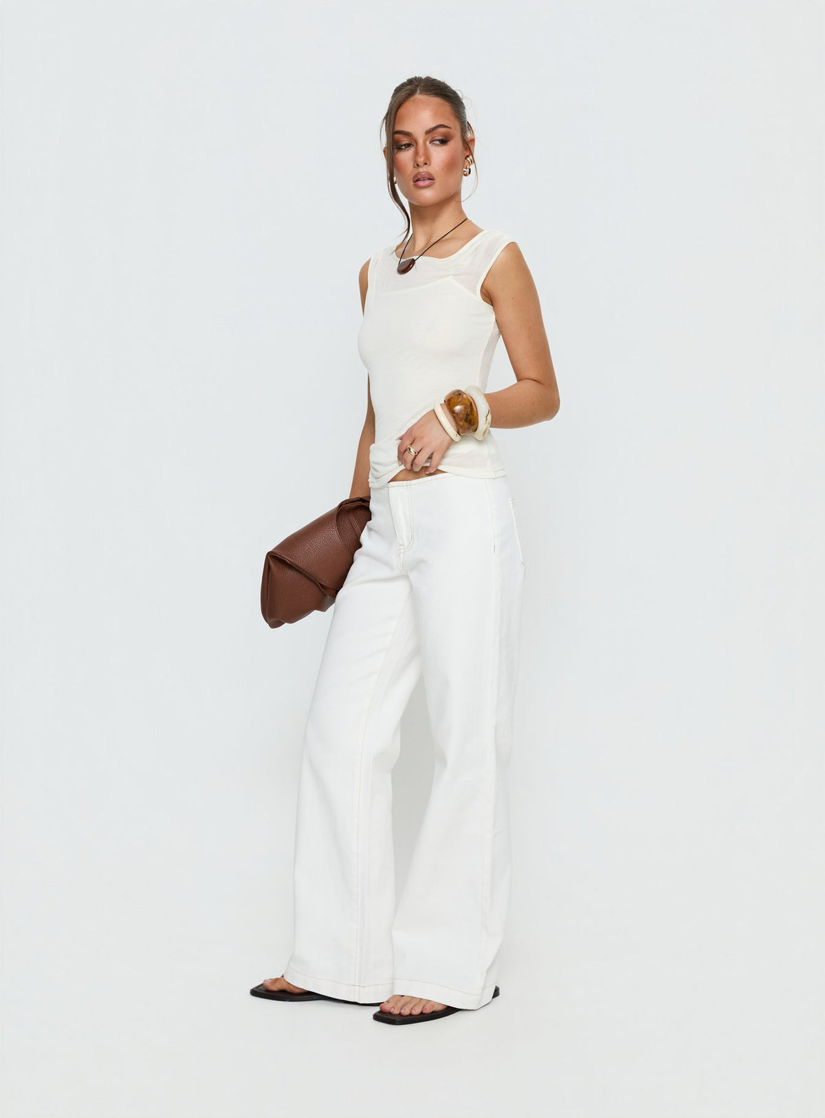 Featuring Buenos No Waist Low Rise Straight Leg Jeans in womens-jeans with low-rise front view of model wearing Princess Polly