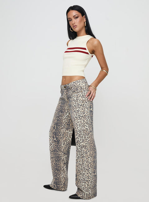 side view of model wearing Princess Polly Top Model Low Rise Straight Leg Jeans Leopard Fade Mid Rise Jeans Jeans 