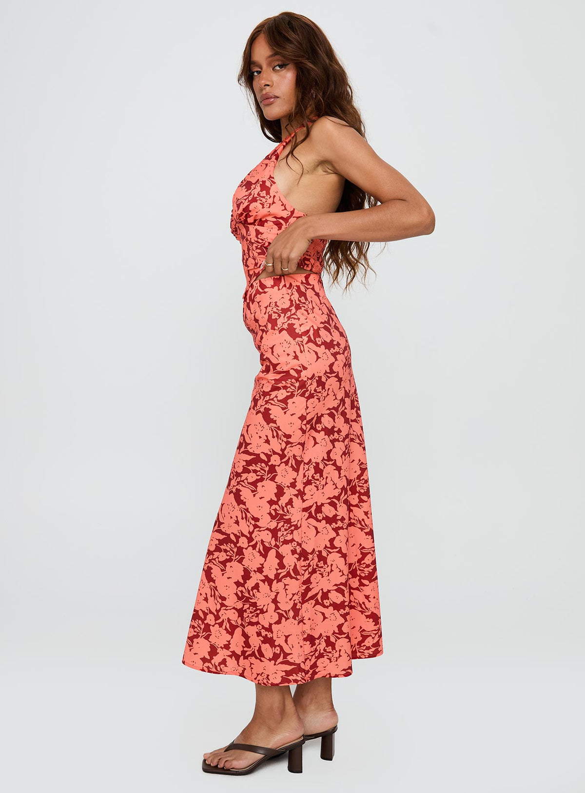   side view of model wearing Princess Polly Casablanca Maxi Skirt Red Floral Maxi Skirts Skirts 