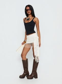   side view of model wearing Princess Polly Winita Macrame Tassel Mini Skirt Cream Mini Skirts Skirts 