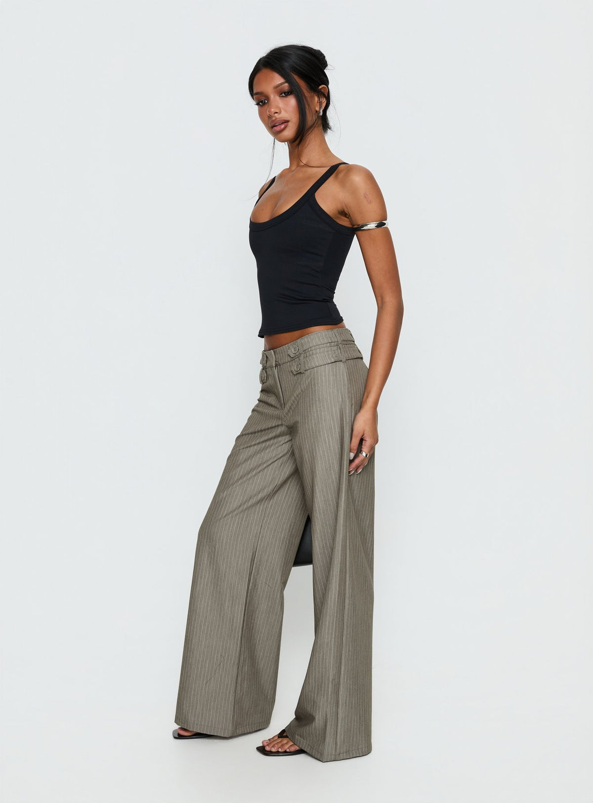 side view of model wearing Princess Polly Jette Tailored Buckle Pant Taupe Pinstripe Mid Rise Pants Pants 