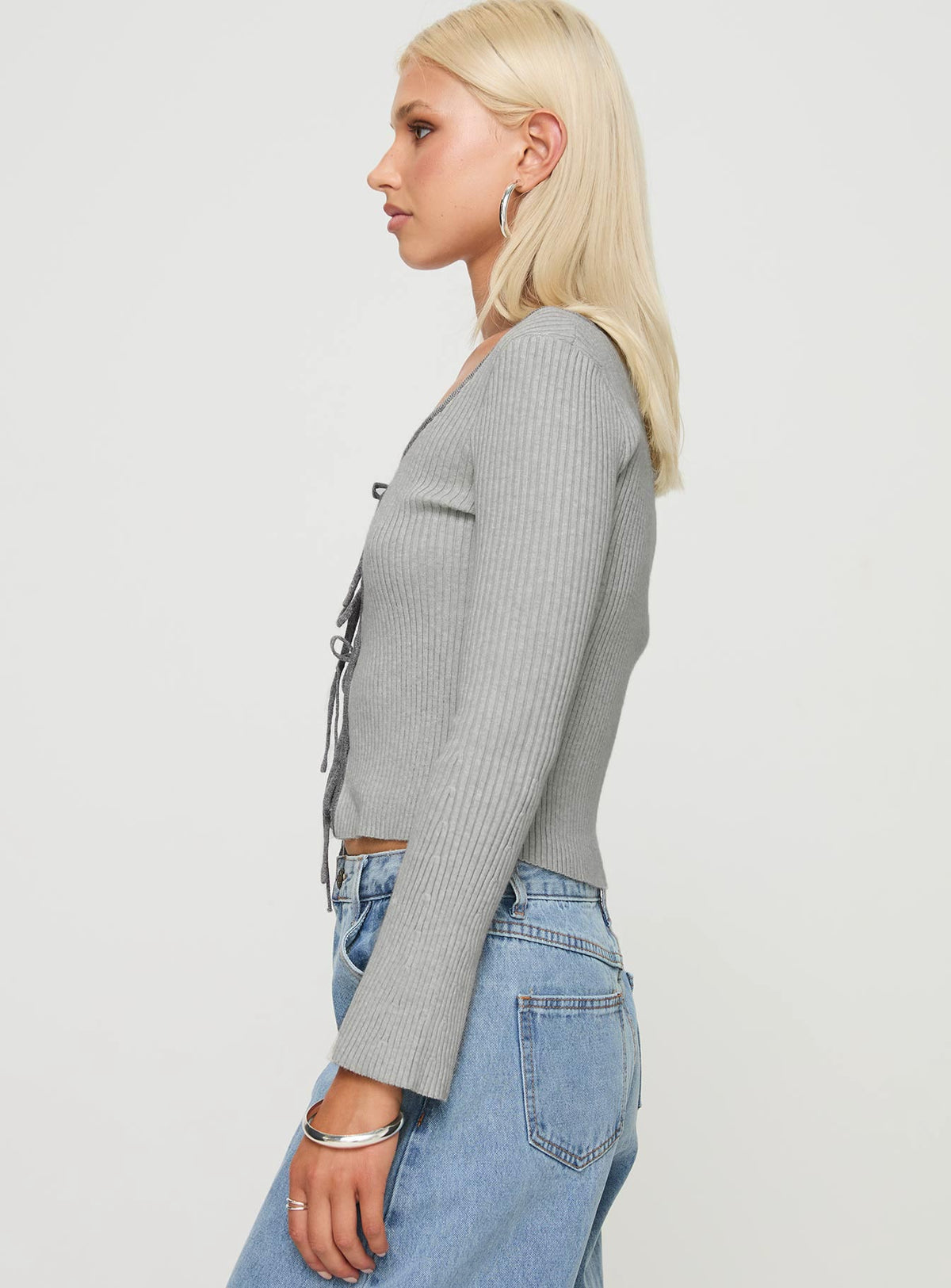 side view of model wearing Princess Polly Tahlea Long Sleeve Top Grey Full Sleeves Scoop Neck 