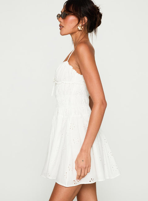 side view of model wearing Princess Polly Wish Me Luck Shirred Mini Dress White Sweetheart Neckline 