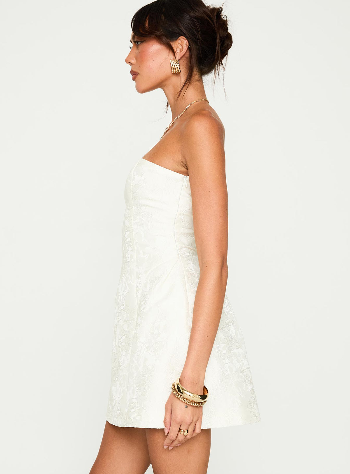side view of model wearing Princess Polly Heaven Sent Strapless Mini Dress White Straight Neck 