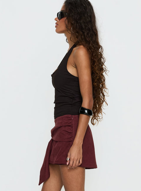   side view of model wearing Princess Polly Lowretta Faux Suede Belt Mini Skirt Burgundy Mini Skirts Skirts 