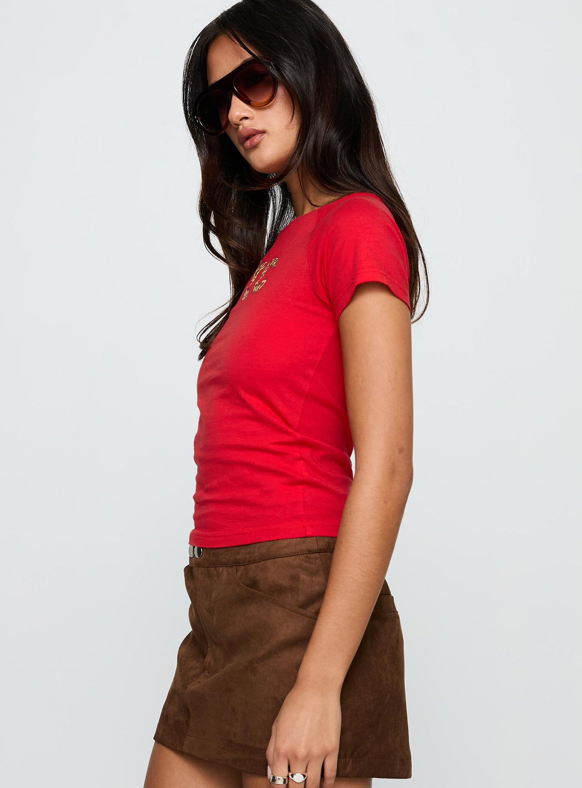 side view of model wearing Princess Polly Nyc Leopard Graphic Top Red Short Sleeves Crew Neck 