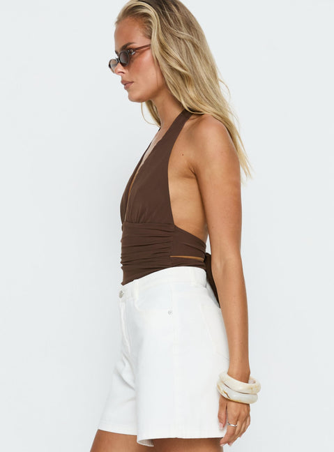 side view of model wearing Princess Polly Cosmic Crush Ruched Halter Bodysuit Brown Sleeveless Bodysuit 