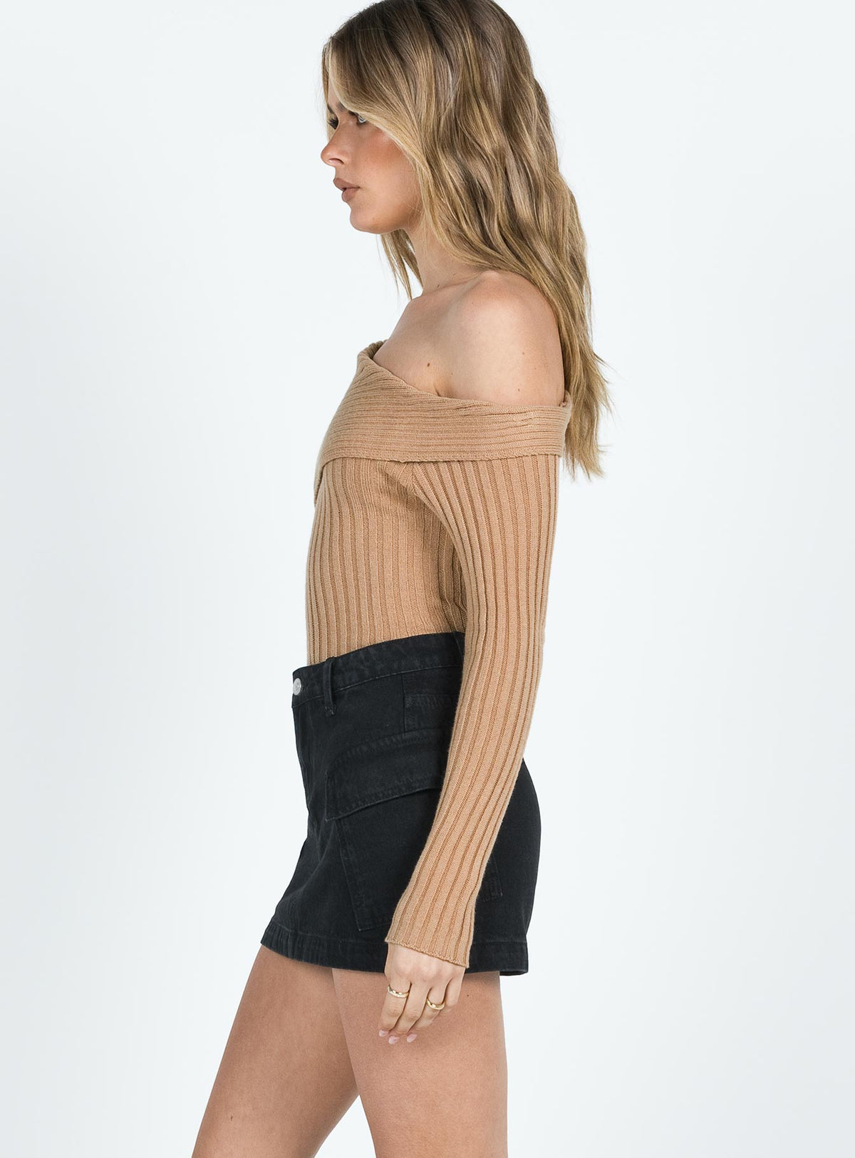   side view of model wearing Princess Polly Zakai Cargo Mini Skirt Black Denim Mini Skirts Skirts 