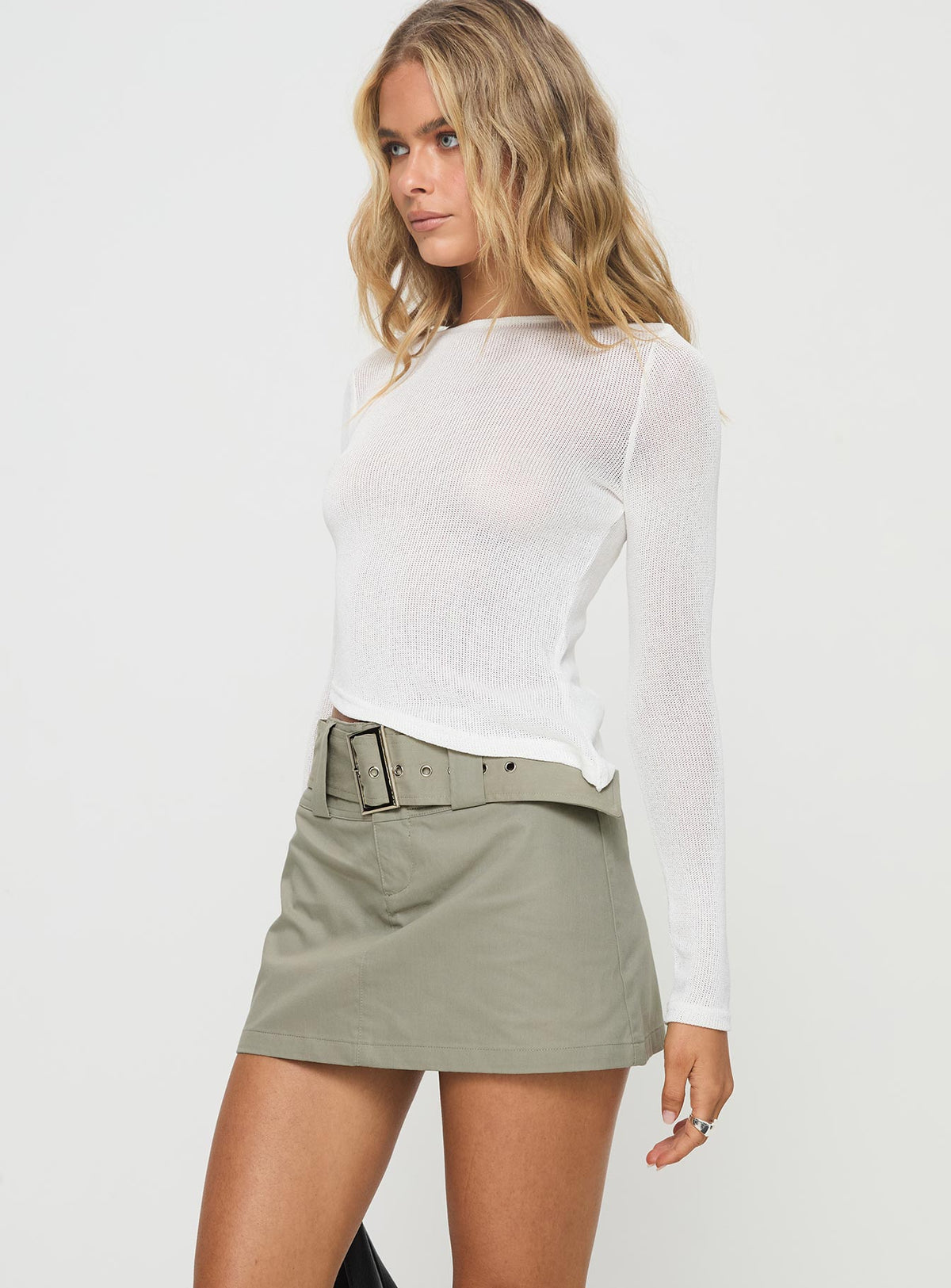 side view of model wearing Princess Polly Pratt Long Sleeve Top White Full Sleeves Boat Neck 