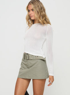 side view of model wearing Princess Polly Pratt Long Sleeve Top White Full Sleeves Boat Neck 