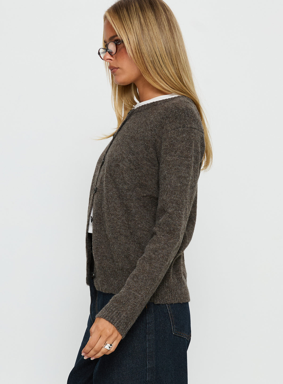 Displaying the Better Than Fiction Cardigan Mocha womens-jumpers with short oversized silhouette side view of model wearing Princess Polly