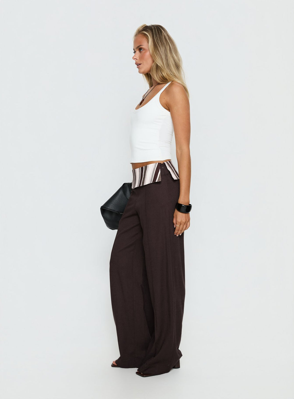 side view of model wearing Princess Polly Quenlin Folded Straight Leg Pant Multi Mid Rise Pants Pants 