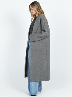 Coat Lapel collar Button fastening at front Front pockets