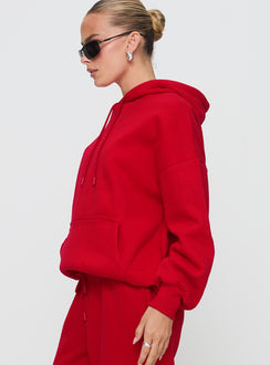 side view of model wearing Princess Polly Dream Fleece Classic Hoodie Red Longline Jumpers Jumpers 
