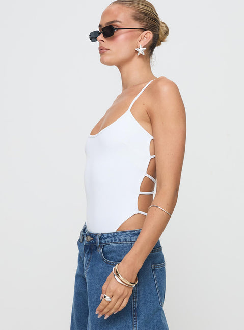 side view of model wearing Princess Polly All Tied Up Bodysuit White Sleeveless Bodysuit 