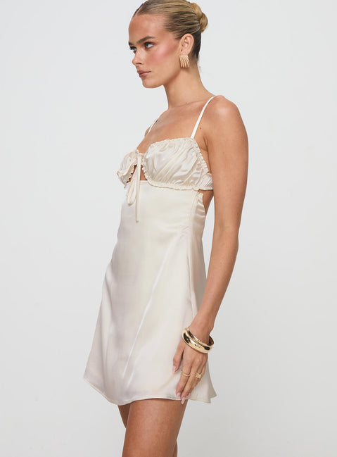 side view of model wearing Princess Polly Decipher Satin Mini Dress Ivory Sweetheart Neckline 