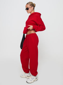 side view of model wearing Princess Polly Dream Fleece Ankle Cuff Sweatpants Red High Rise Pants Pants 