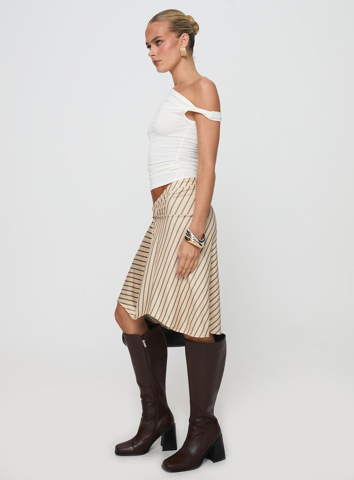   side view of model wearing Princess Polly Esmeray Midi Skirt Diagonal Stripe Yellow Skirts 