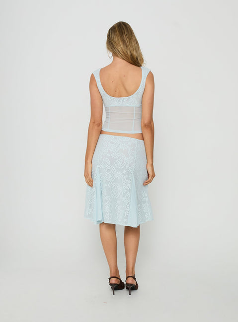 Designed with floral lace hem, the Quani Midi Skirt Blue womens-skirts in powder blue and white back view of model wearing Princess Polly
