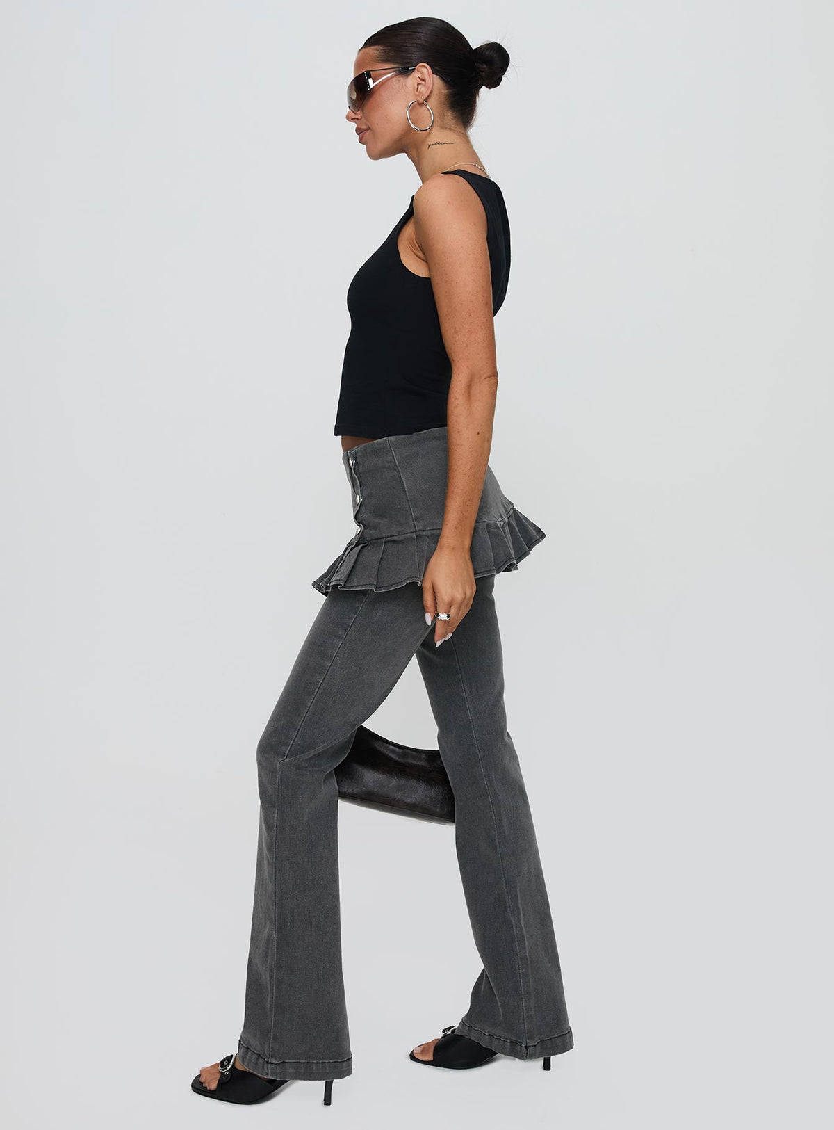 side view of model wearing Princess Polly Jordynne Layered Pant Washed Black High Rise Pants Pants 