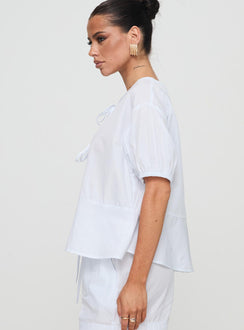 side view of model wearing Princess Polly Sunblind Top White Half Sleeves Crew Neck 