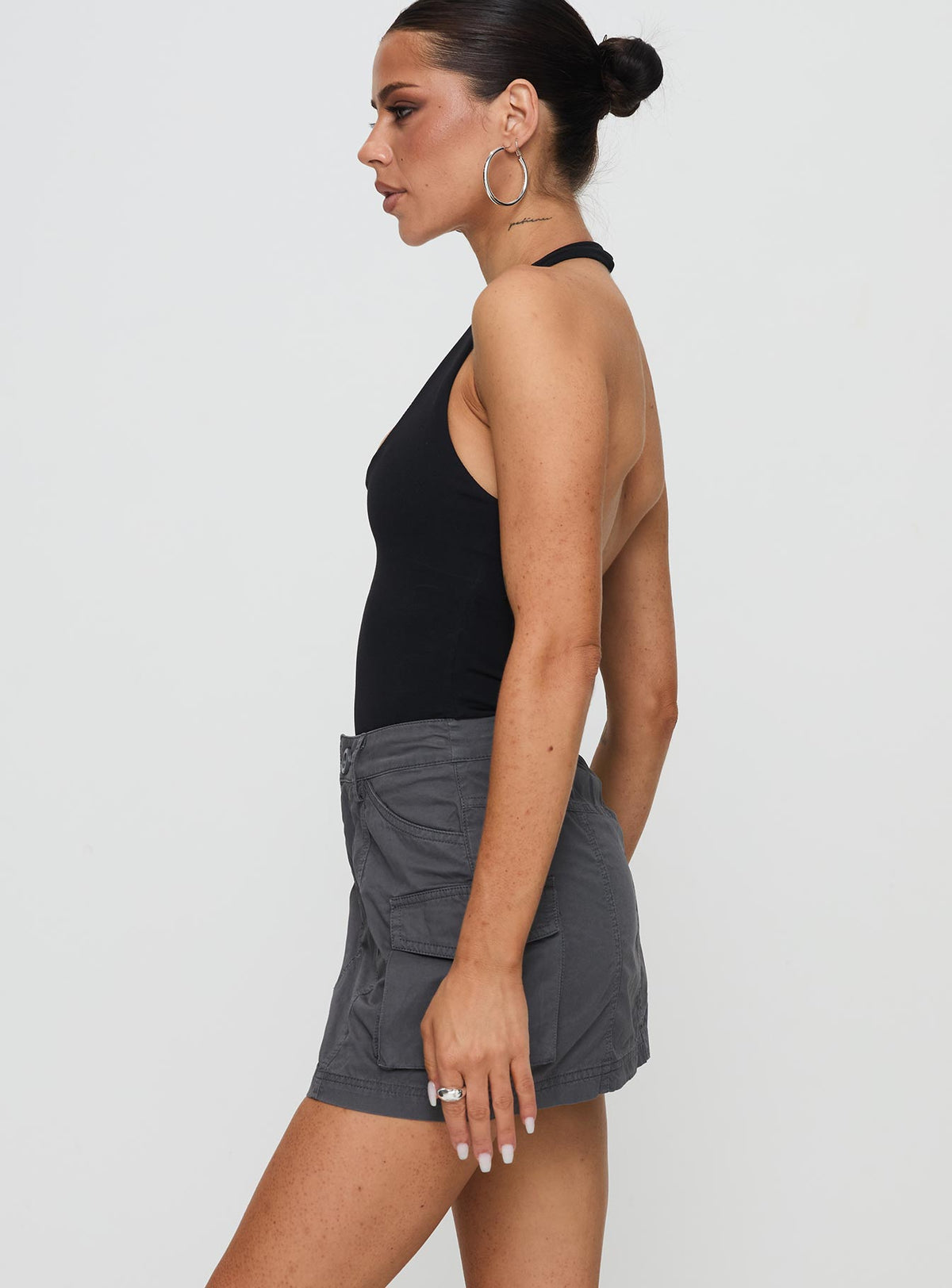   side view of model wearing Princess Polly Lieutenant Cargo Mini Skirt Slate Mini Skirts Skirts 
