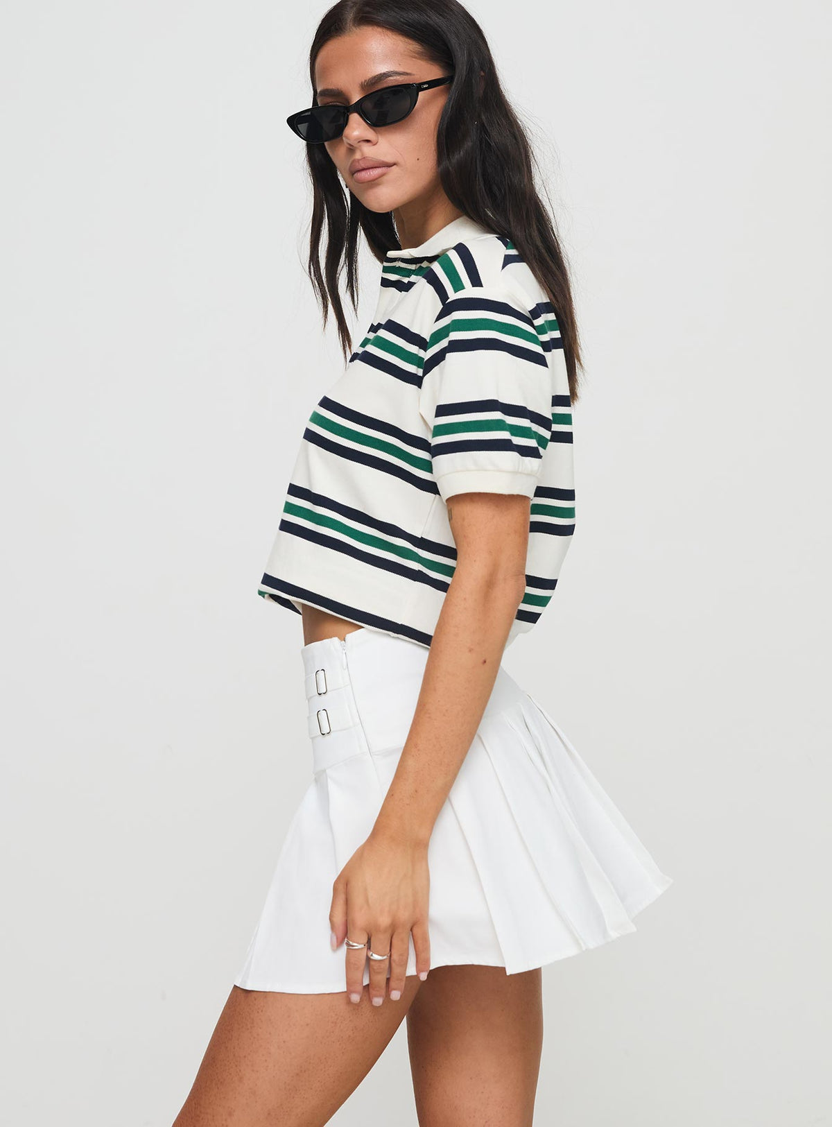   side view of model wearing Princess Polly Cartwright Mini Skirt White Mini Skirts Skirts 