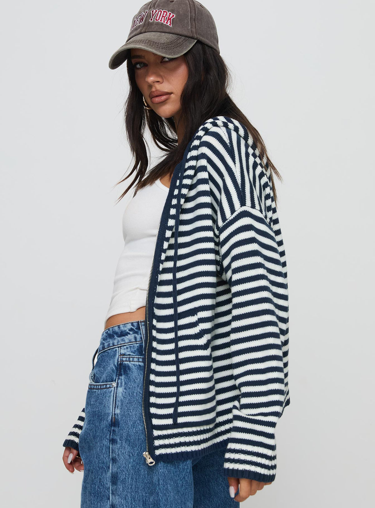 side view of model wearing Princess Polly Brienna Zip Jacket Navy Longline Jumpers Jumpers 