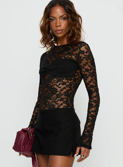 side view of model wearing Princess Polly Anjolene Lace Wrap Bust Bodysuit Black Long Sleeve Tops Bodysuit 