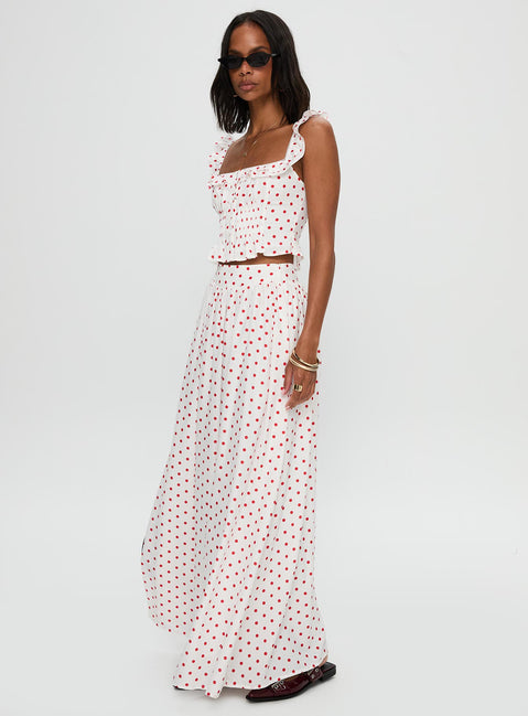   side view of model wearing Princess Polly Valerio Maxi Skirt White / Red Maxi Skirts Skirts 