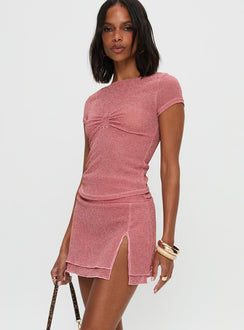   side view of model wearing Princess Polly Flattered Shimmer Mini Skirt Pink Mini Skirts 