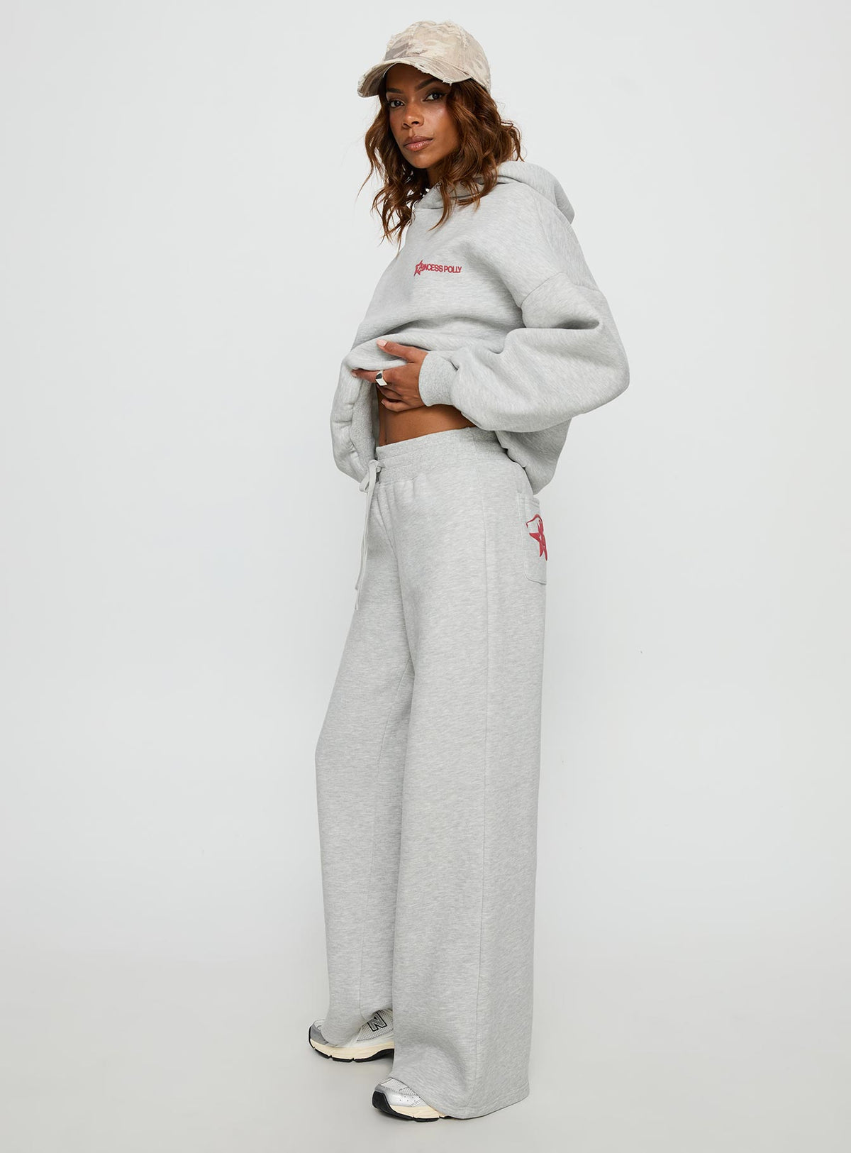 side view of model wearing Princess Polly Princess Polly Stargirl Wide Leg Sweat Pants Grey Marle High Rise Pants Pants 