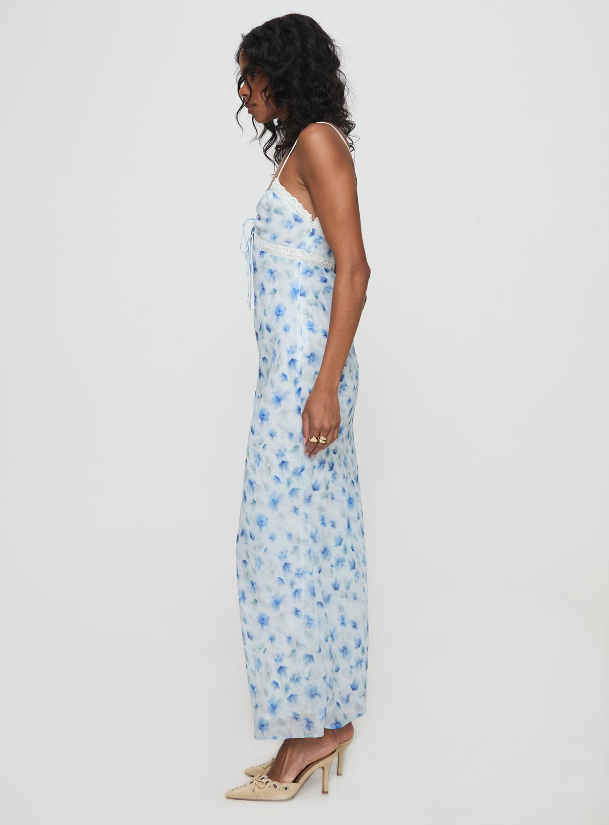 side view of model wearing Princess Polly Emily Maxi Dress Blue Floral V-Neck 