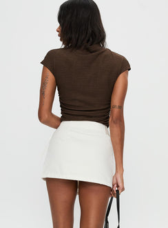 back view of model wearing Princess Polly Elinora Wrap Mini Skirt White Mini Skirts Skirts 