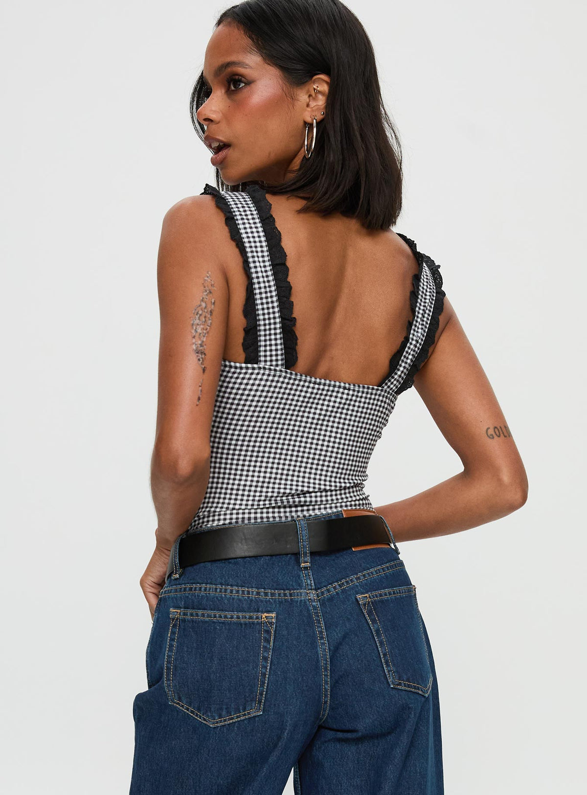back view of model wearing Princess Polly Trustfund Lace Trim Bodysuit Black / White Check Sleeveless Bodysuit 