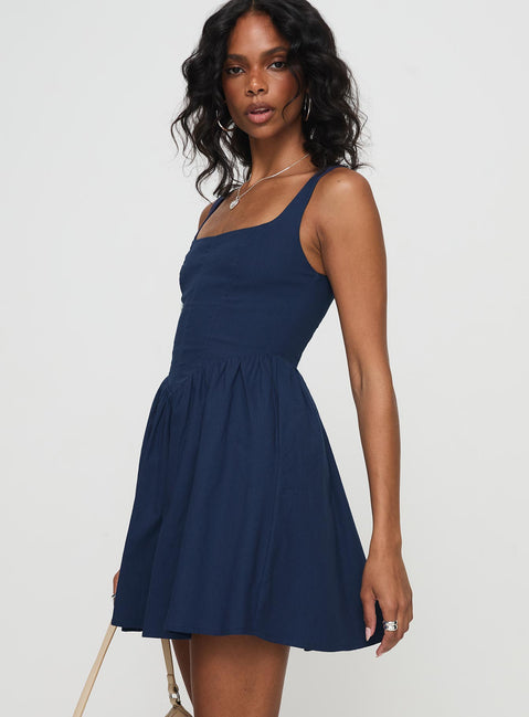 side view of model wearing Princess Polly Martie Mini Dress Navy Square Neck 