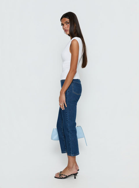 side view of model wearing Princess Polly Cindee High Rise Cropped Jeans Mid Blue Wash High Rise Jeans Jeans 