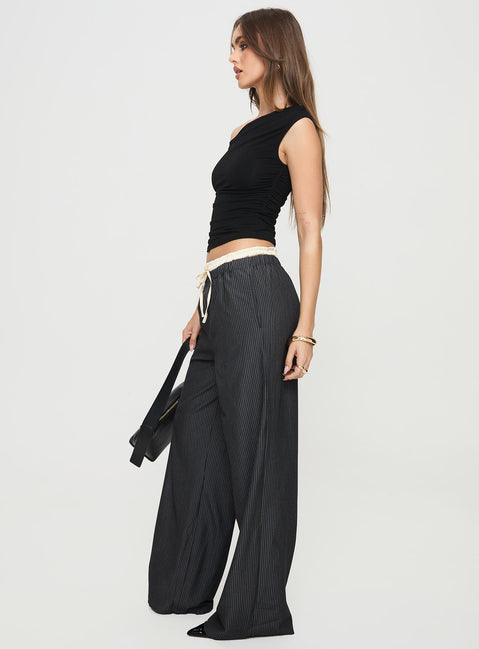side view of model wearing Princess Polly Seraphic Pants Charcoal Stripe High Rise Pants Pants 