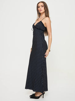 side view of model wearing Princess Polly Emily Maxi Dress Black Polka Dot V-Neck 