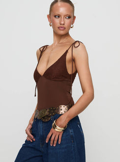 side view of model wearing Princess Polly Prichard Bodysuit Brown Sleeveless Bodysuit 
