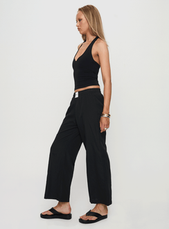 side view of model wearing Princess Polly Beach House Pants Black Low Rise Pants Pants 