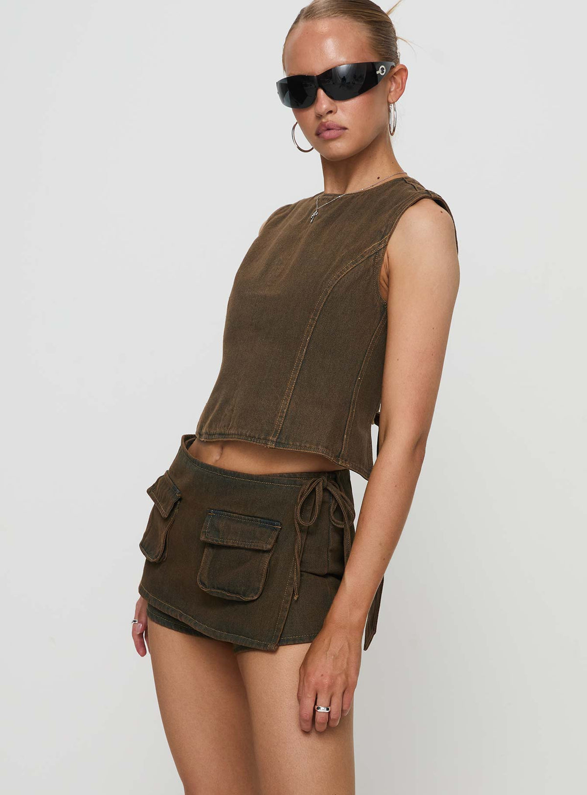 side view of model wearing Princess Polly Countryside Skort Petrol High Waisted Shorts 